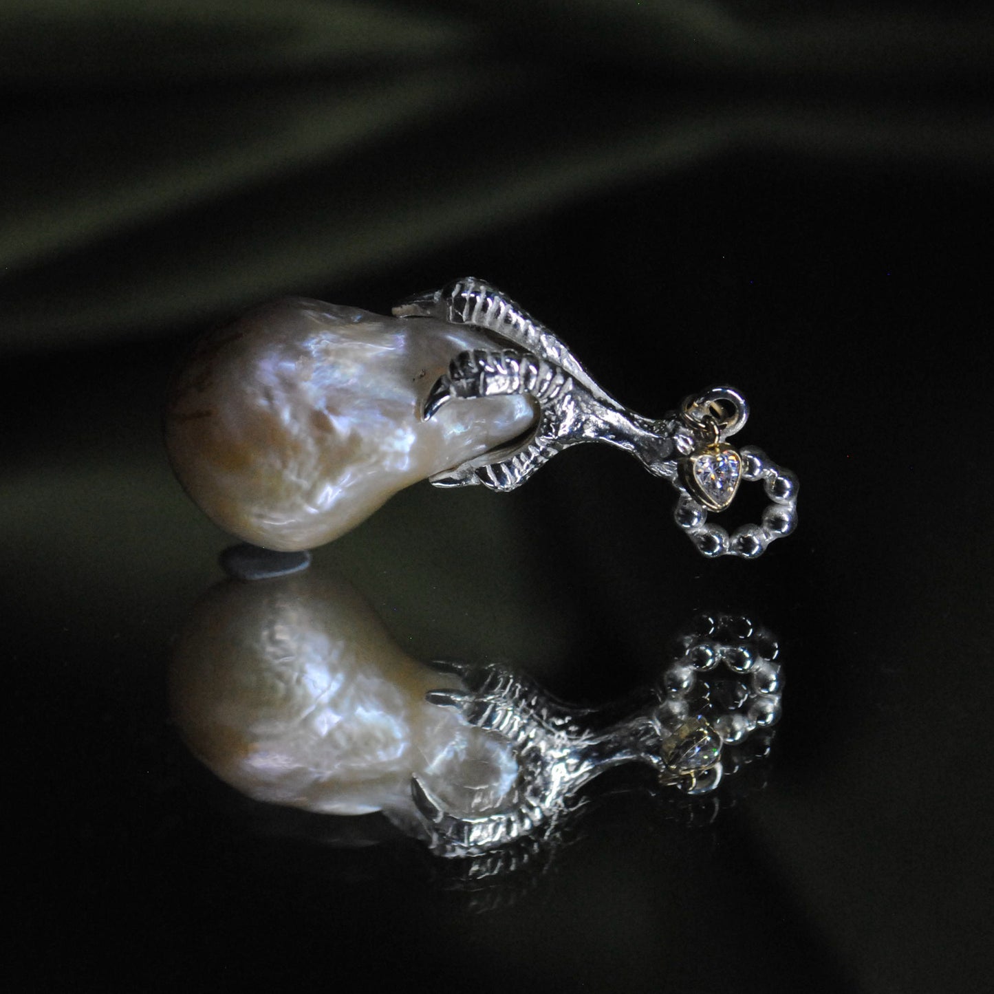 SERAPH CLAW CHARM