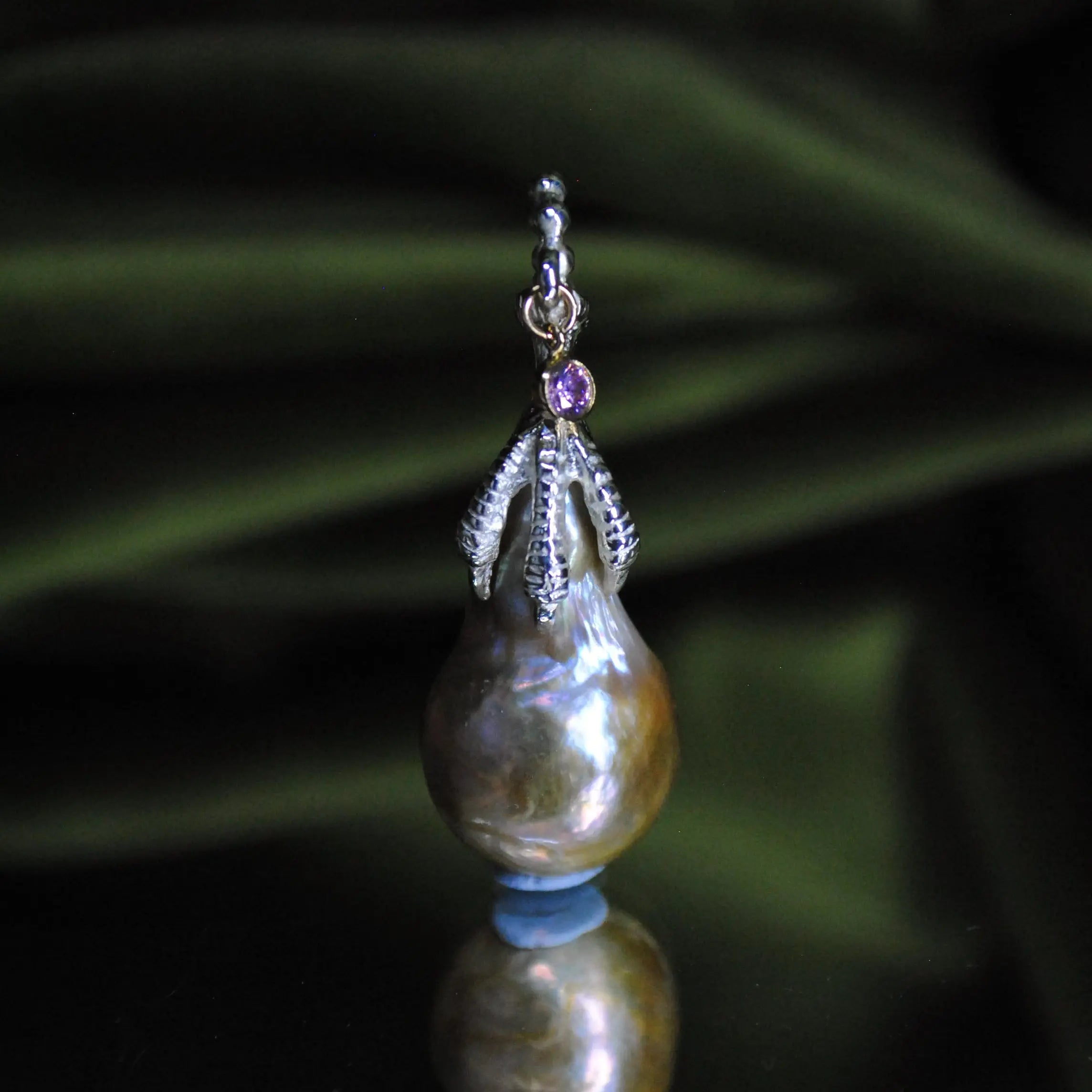 SERAPH CLAW CHARM The Baptist