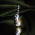 SERAPH CLAW CHARM The Baptist