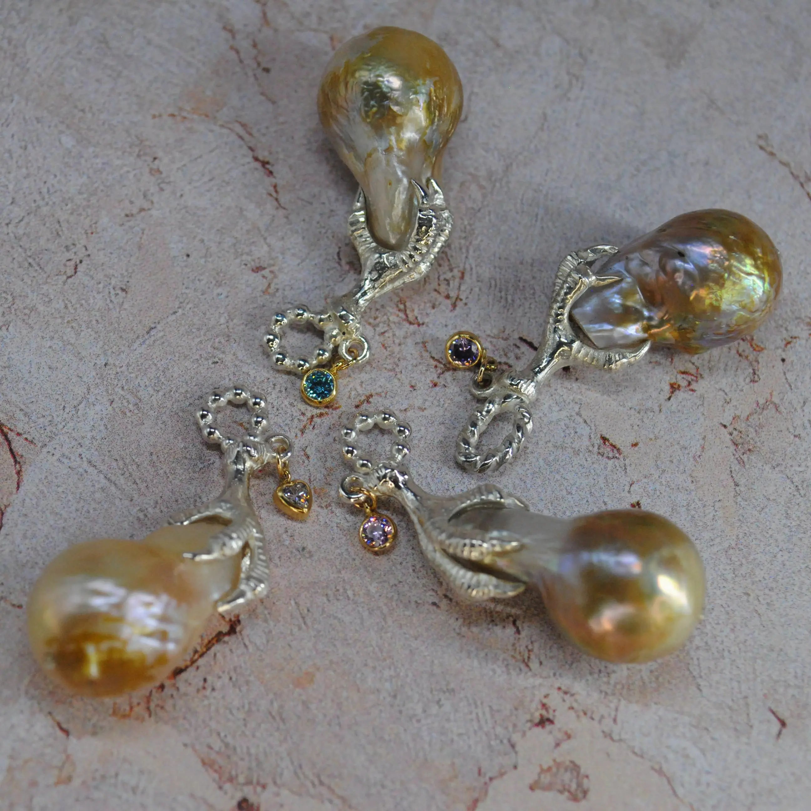 SERAPH CLAW CHARM The Baptist